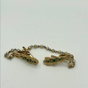 Vintage gold tone sweater clip